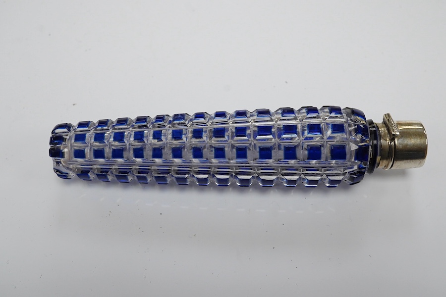 A 19th century blue overlay glass scent bottle with square ribbed design, 12cm long. Condition - good